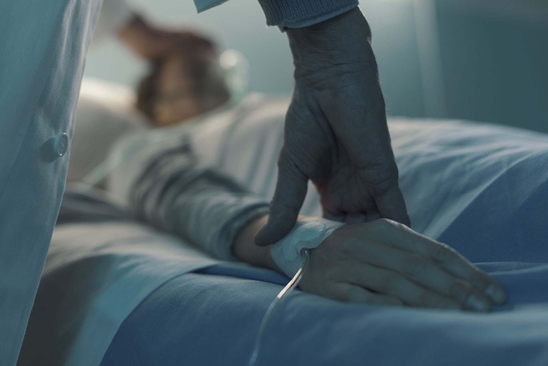 Doctor assisting a young patient at the hospital